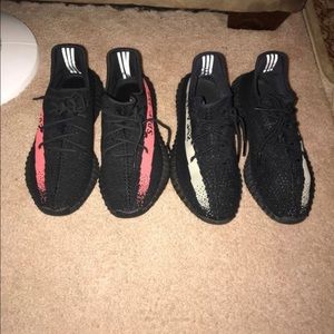 Yeezys 350 v2 black red stripe
